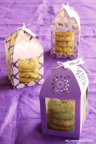 Paper lanterns are filled with cookies as favor boxes for Ramadan.