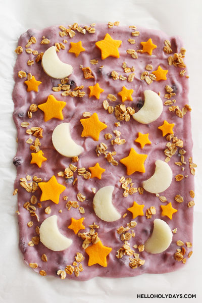 Ramadan yogurt bark is displayed on parchment paper.